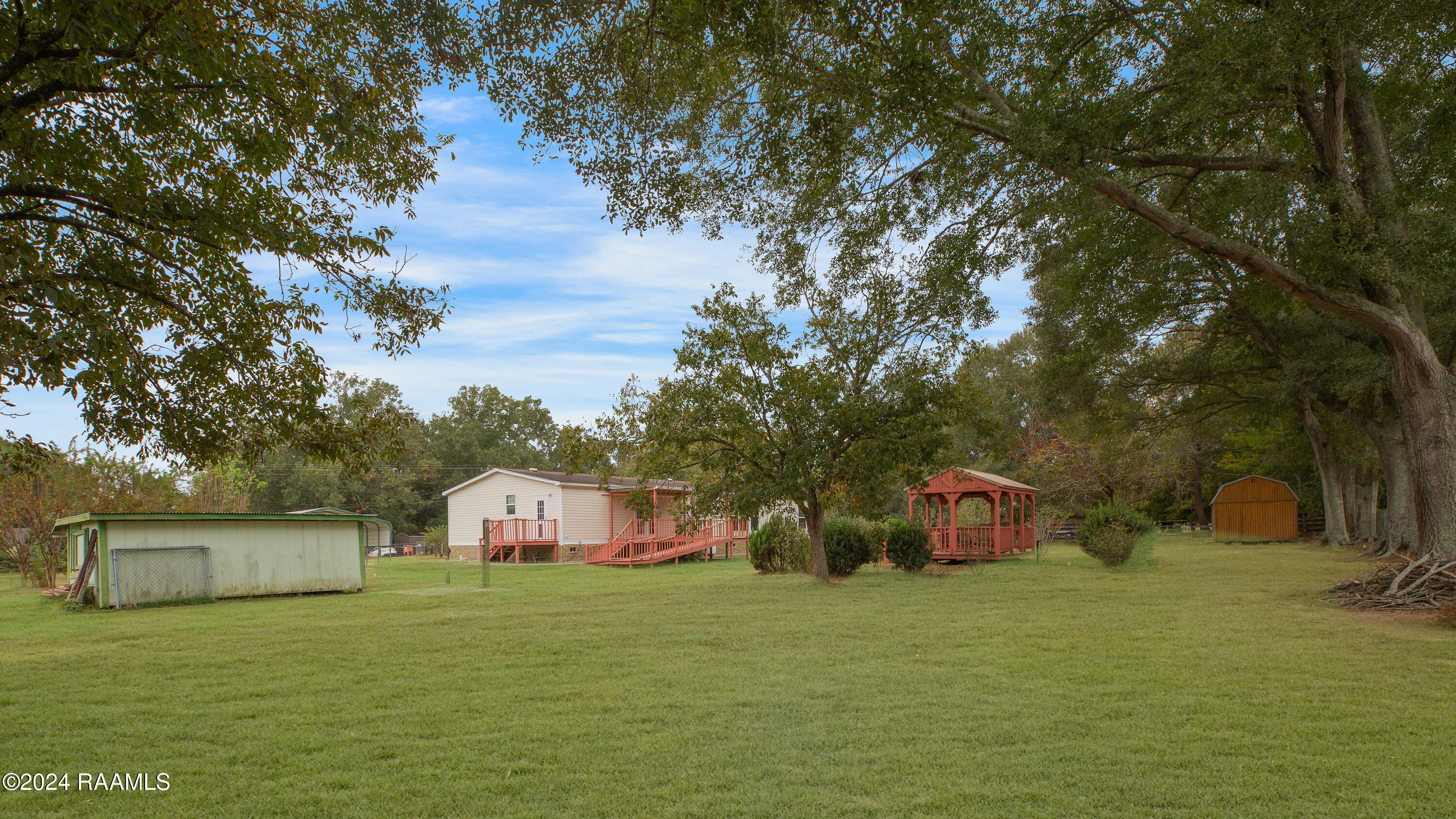 1657 Montgomery Road Opelousas, LA 70570 - Photo 24 of 29 Run in shed and storage building