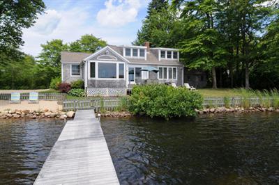 27 Nyes Point Way Centerville, MA 02632 - Photo 1 of 11 a front view of a house with a yard
