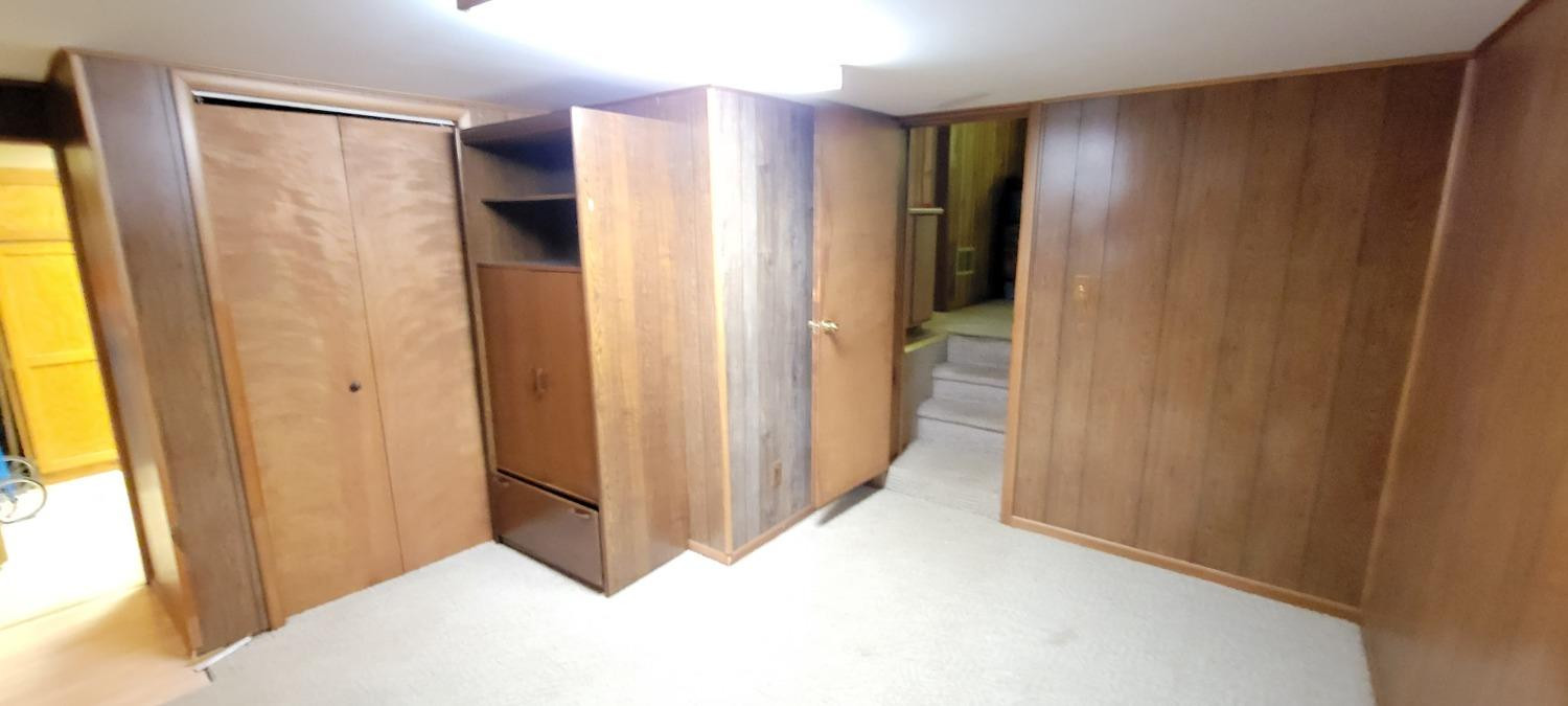 3402 North Wozniak Road Michigan City, IN 46360 - Photo 15 of 24 a view of a bathroom with a sink and a mirror