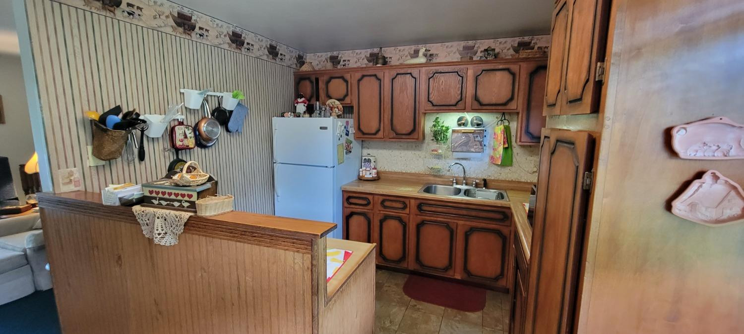 3402 North Wozniak Road Michigan City, IN 46360 - Photo 6 of 24 a utility room with dryer and washer