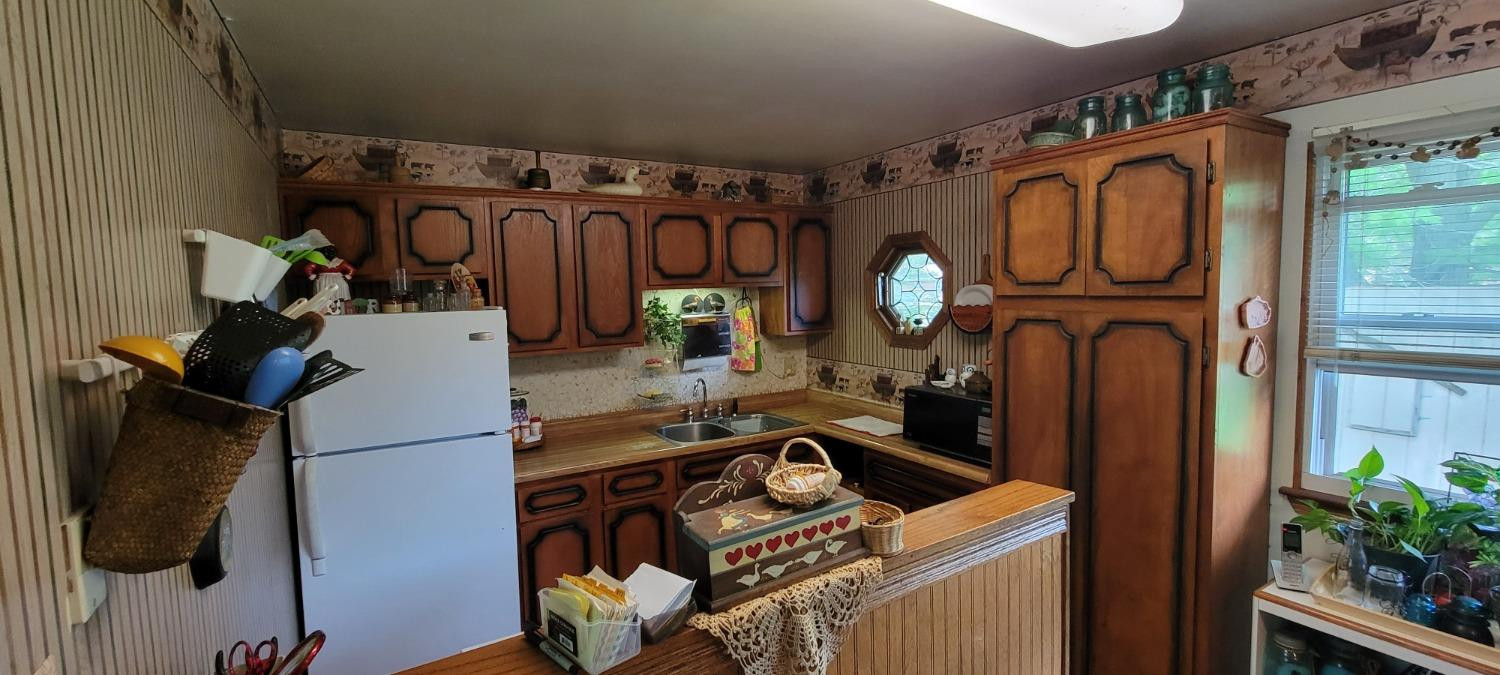 3402 North Wozniak Road Michigan City, IN 46360 - Photo 7 of 24 a utility room with dryer and washer