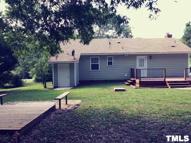 a view of a backyard with a garden