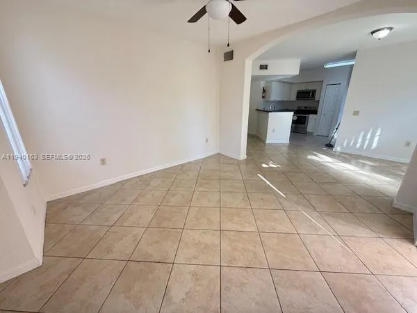 a view of a kitchen with a sink and dishwasher in a kitchen