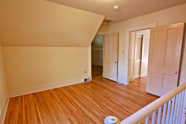 11814 Maple Avenue Hebron, IL 60034 - Photo 12 of 20 a view of an empty room with wooden floor