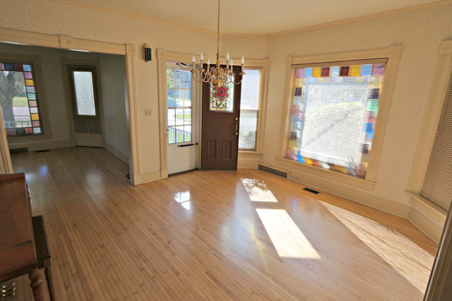 11814 Maple Avenue Hebron, IL 60034 - Photo 7 of 20 a view of gallery with window and wooden floor