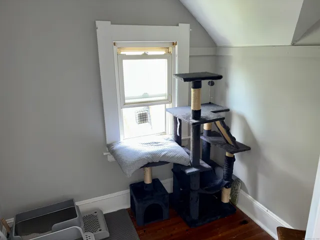 a view of a livingroom with furniture and window