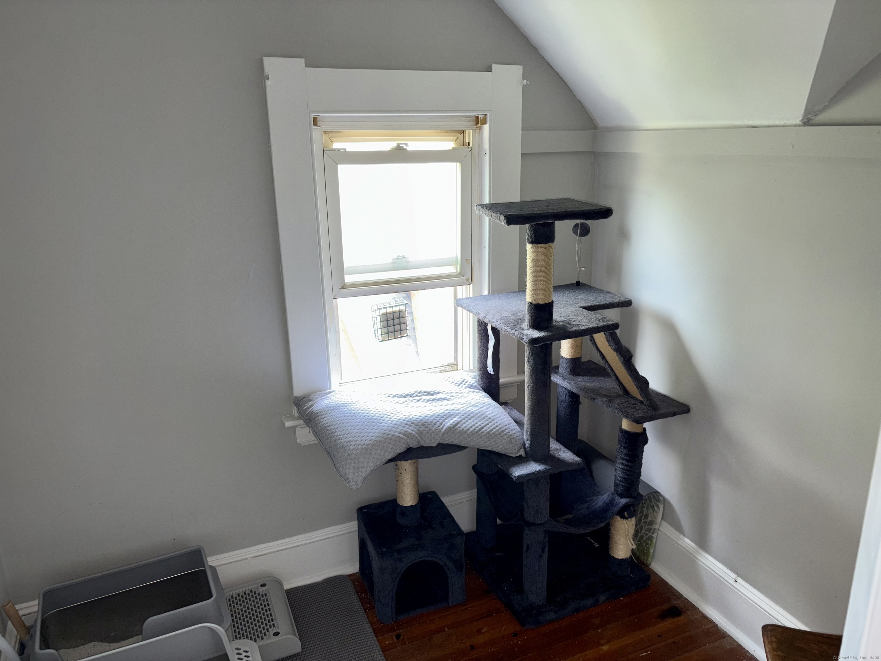 37 Hungerford Avenue, Unit 3 Watertown, CT 06779 - Photo 11 of 15 a view of a livingroom with furniture and window