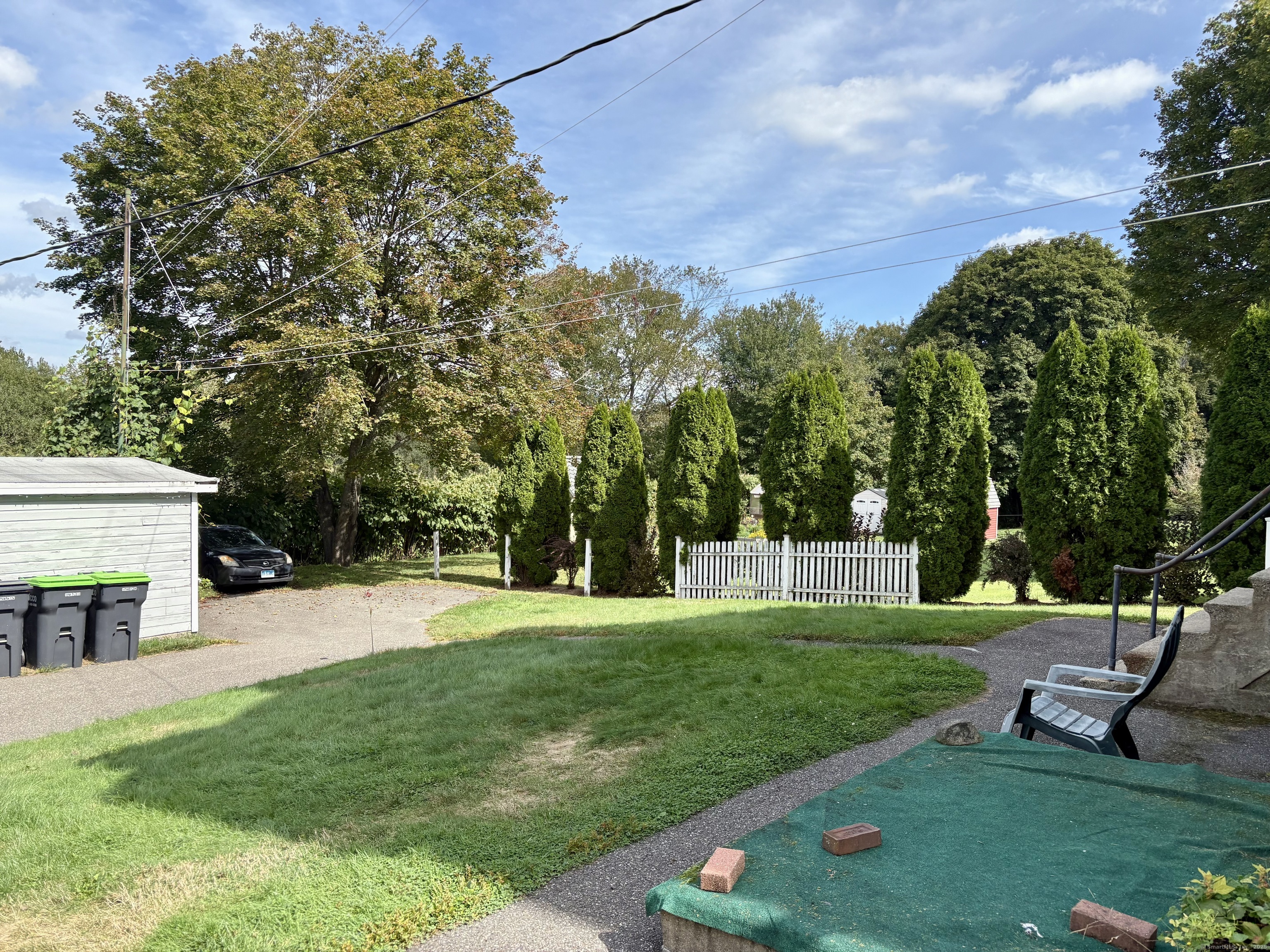 37 Hungerford Avenue, Unit 3 Watertown, CT 06779 - Photo 14 of 15 a view of a backyard with sitting area