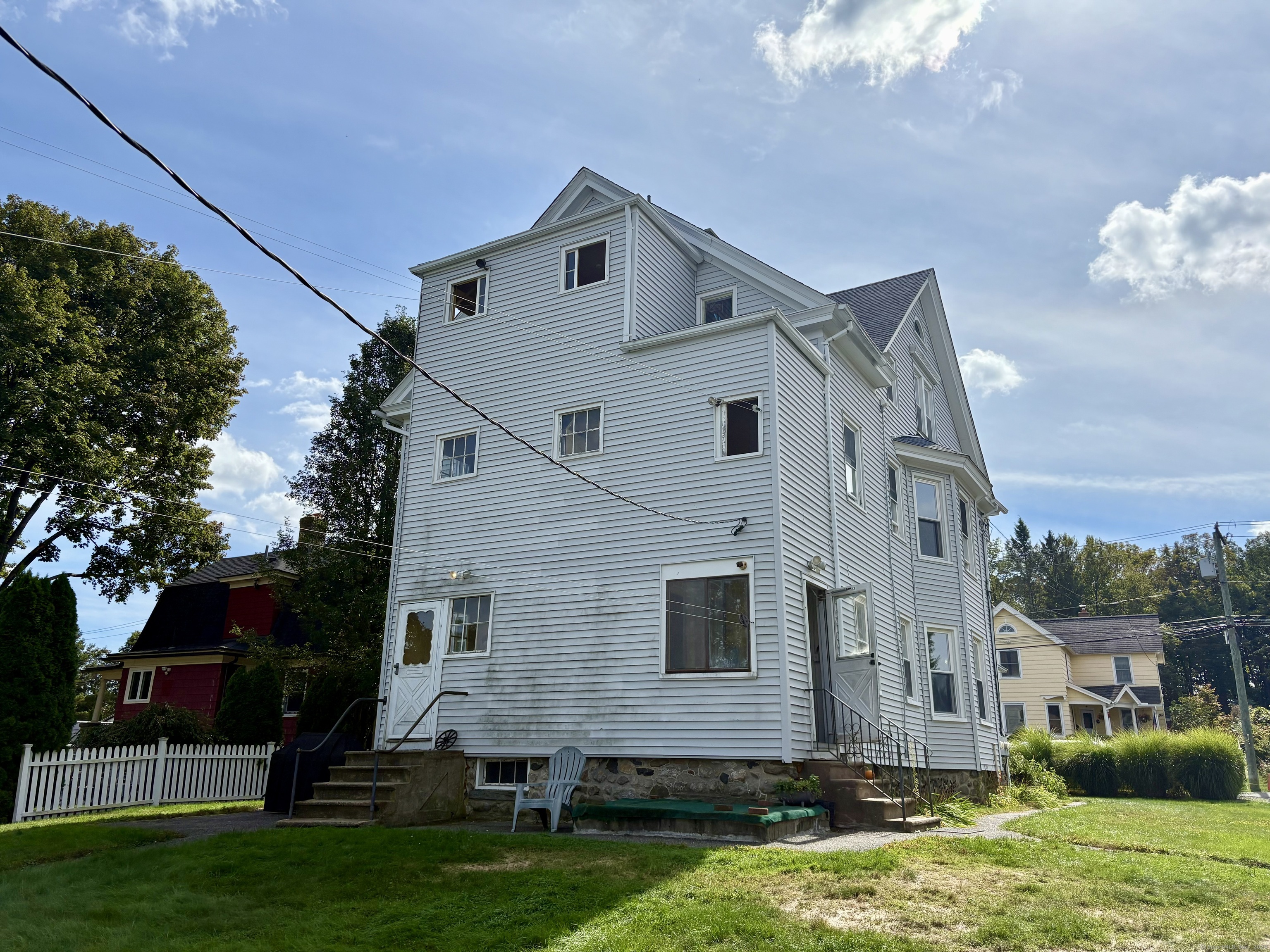 37 Hungerford Avenue, Unit 3 Watertown, CT 06779 - Photo 15 of 15 a view of a house with a yard