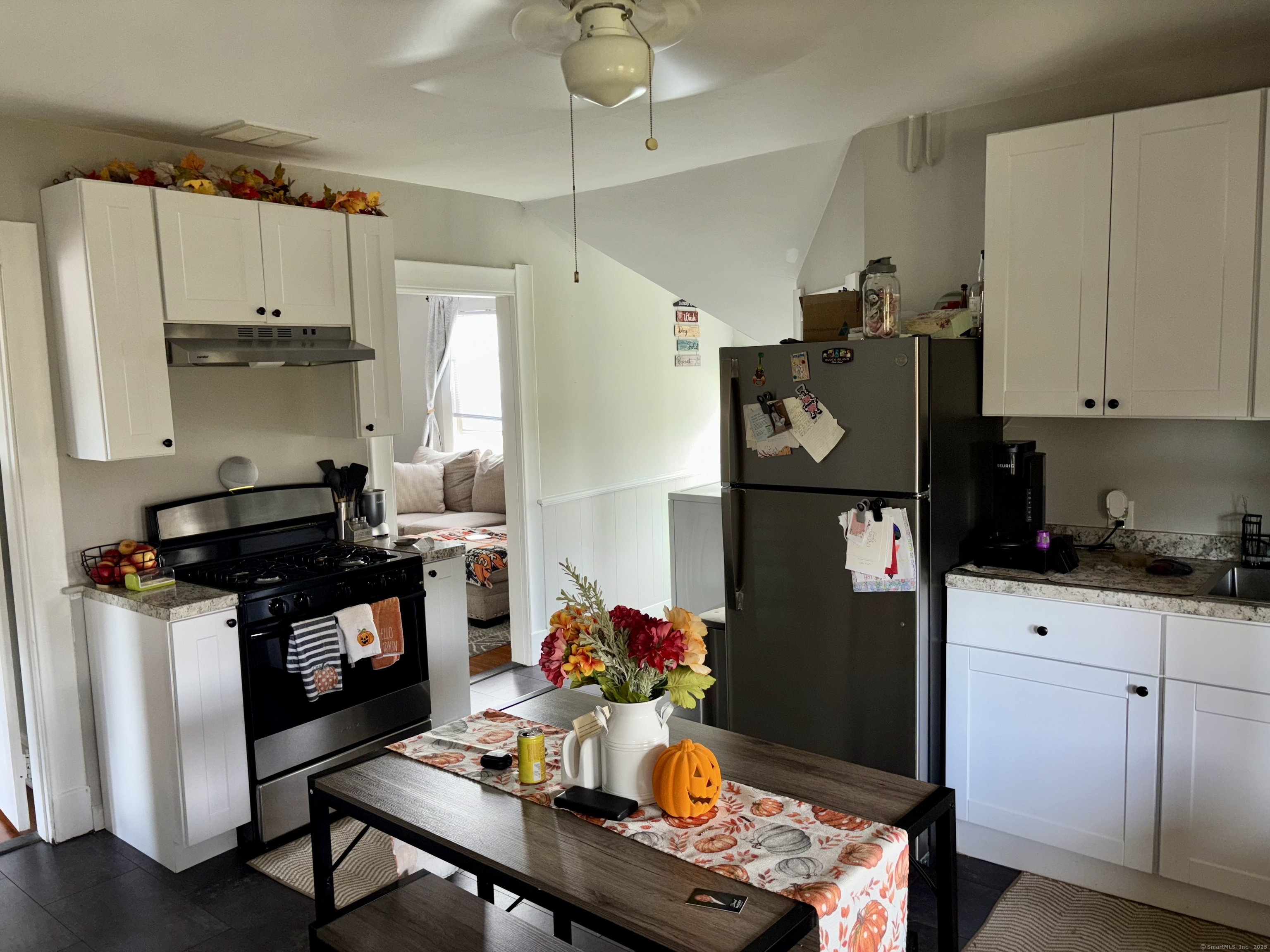 37 Hungerford Avenue, Unit 3 Watertown, CT 06779 - Photo 2 of 15 a kitchen with stainless steel appliances granite countertop a refrigerator and stove