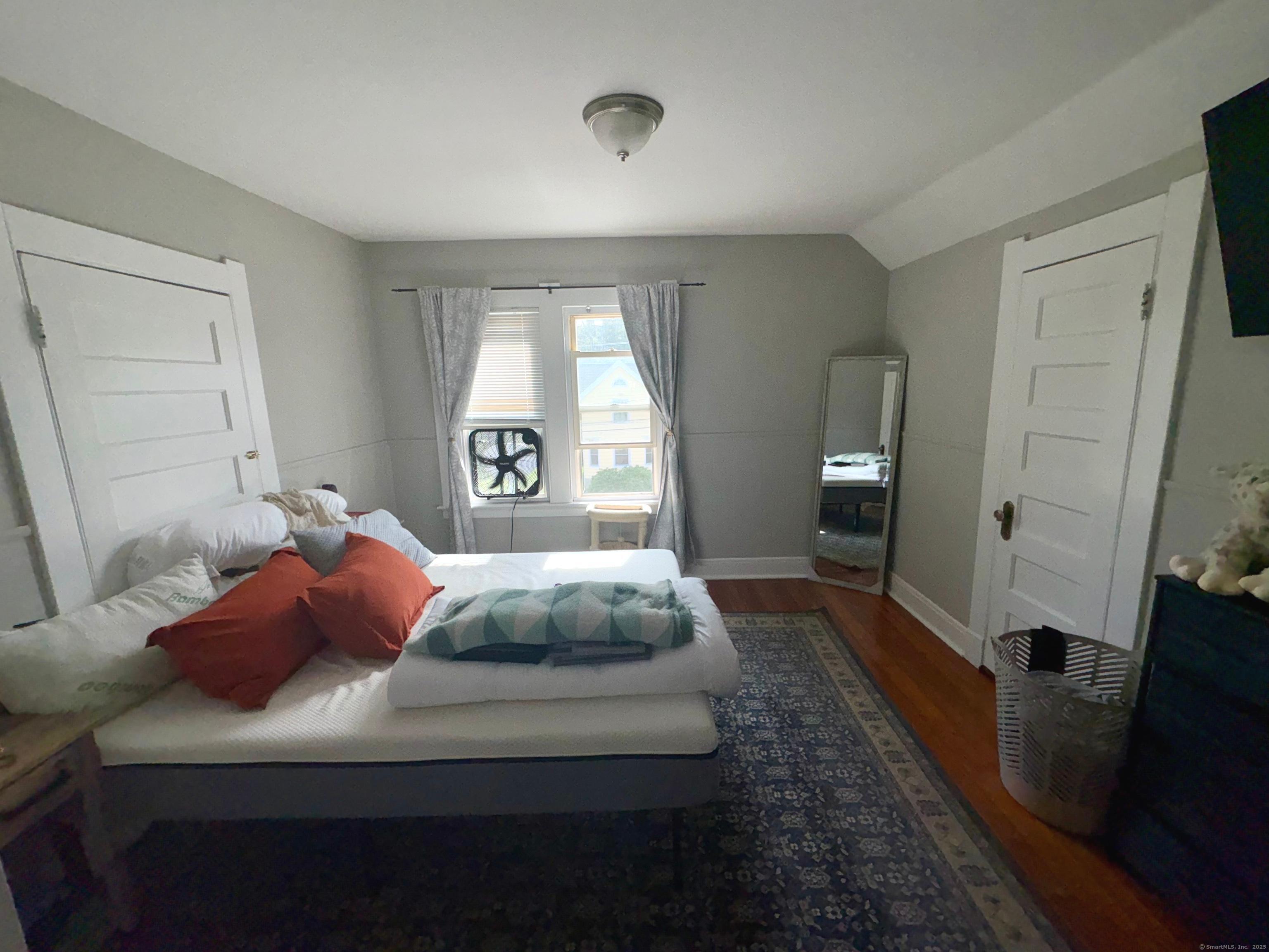 37 Hungerford Avenue, Unit 3 Watertown, CT 06779 - Photo 6 of 15 a bedroom with a large bed and a dresser