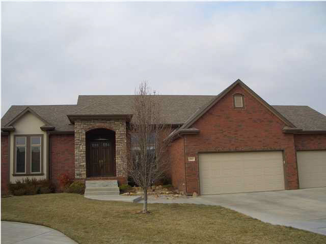 Incredible Brick and stone curb appeal.