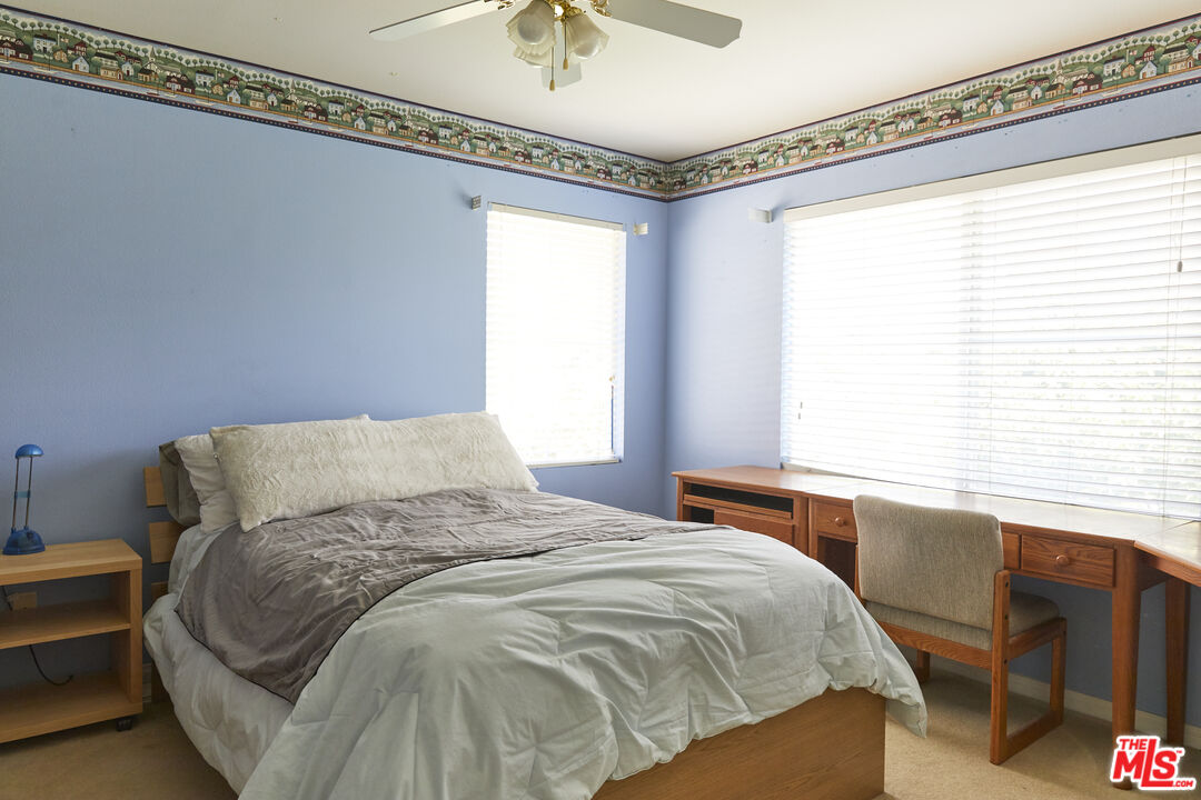 6 Mountainbrook Irvine, CA 92620 - Photo 18 of 31 a bedroom with a bed and a window