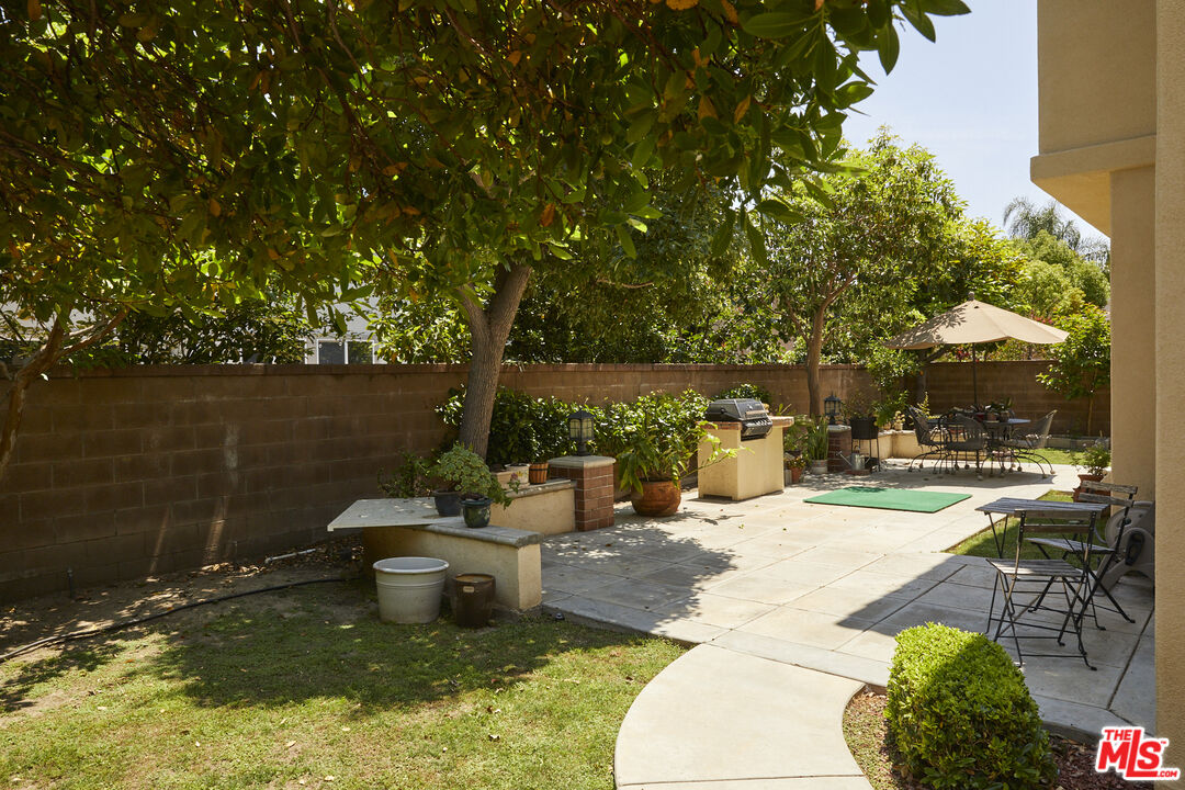 6 Mountainbrook Irvine, CA 92620 - Photo 23 of 31 a view of a swimming pool with a patio