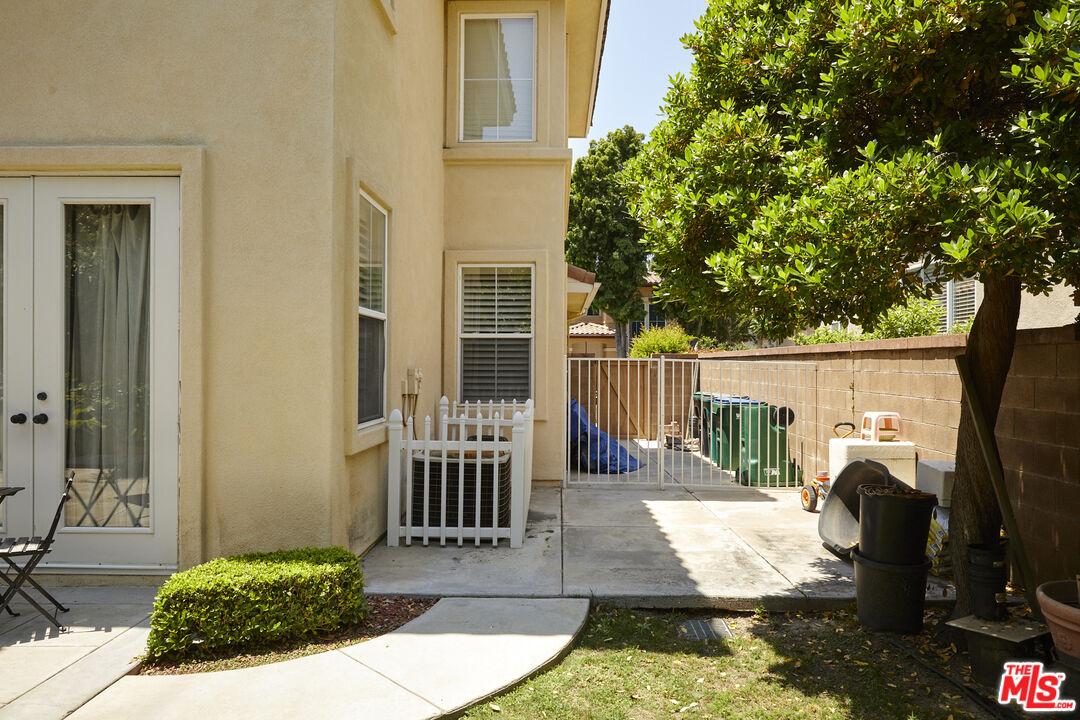 6 Mountainbrook Irvine, CA 92620 - Photo 25 of 31 a view of a house with a small yard and wooden fence