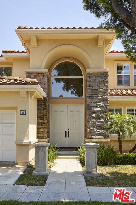 6 Mountainbrook Irvine, CA 92620 - Photo 27 of 31 a front view of a house with parking