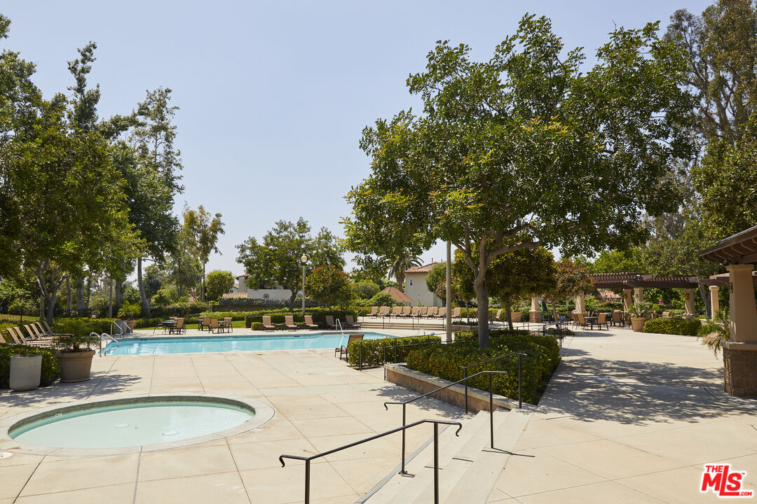6 Mountainbrook Irvine, CA 92620 - Photo 29 of 31 a swimming pool with outdoor seating and yard