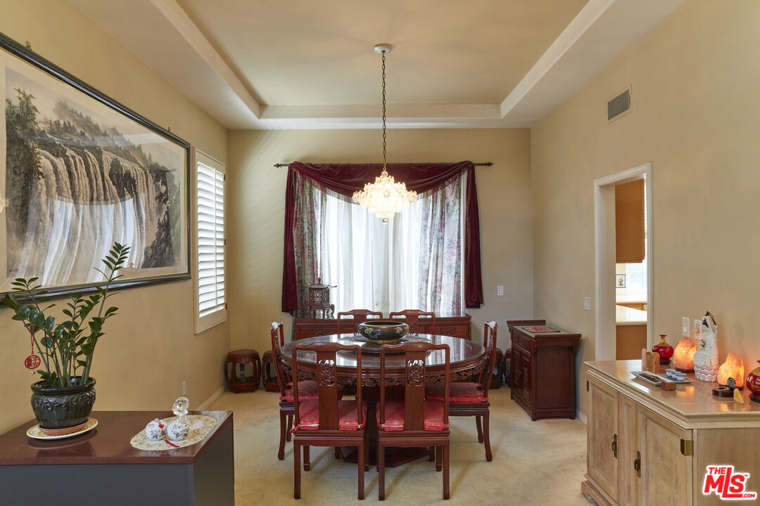 6 Mountainbrook Irvine, CA 92620 - Photo 5 of 31 a dining room with furniture and window