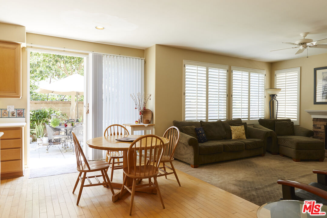 6 Mountainbrook Irvine, CA 92620 - Photo 9 of 31 a living room with furniture and floor to ceiling windows