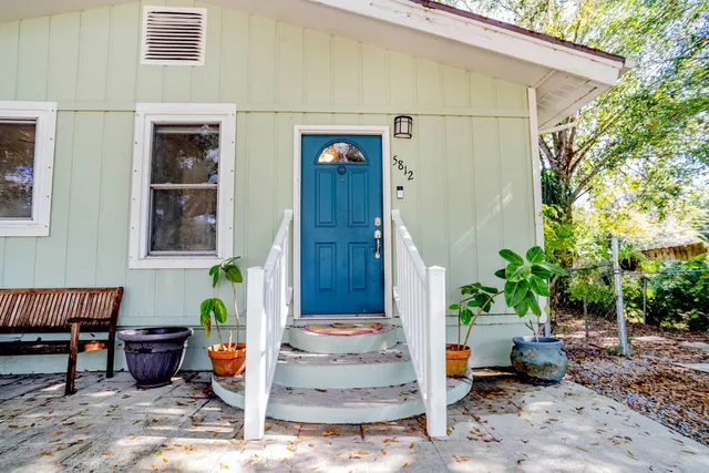 a front view of a house with patio