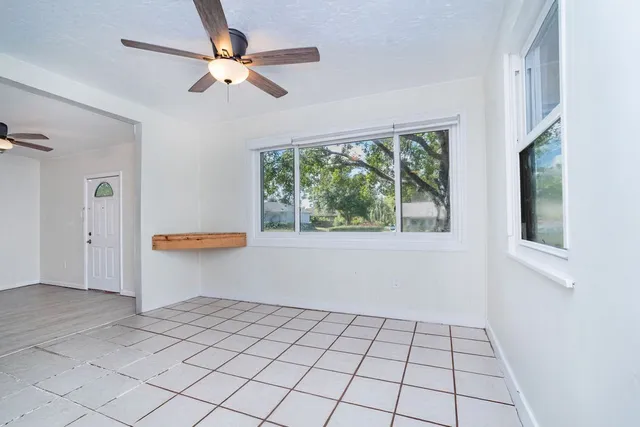 a view of an empty room and window