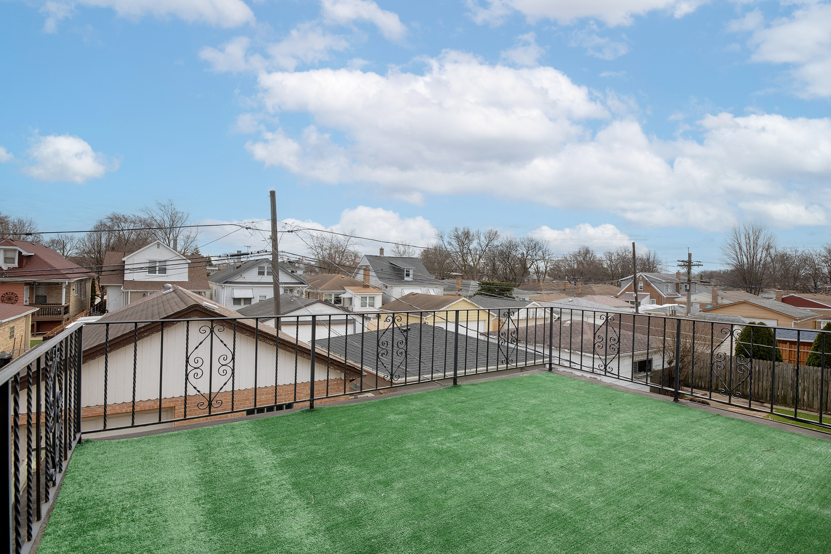 5353 North Nottingham Avenue Chicago, IL 60656 - Photo 15 of 20 a view of a house with a big yard and large trees