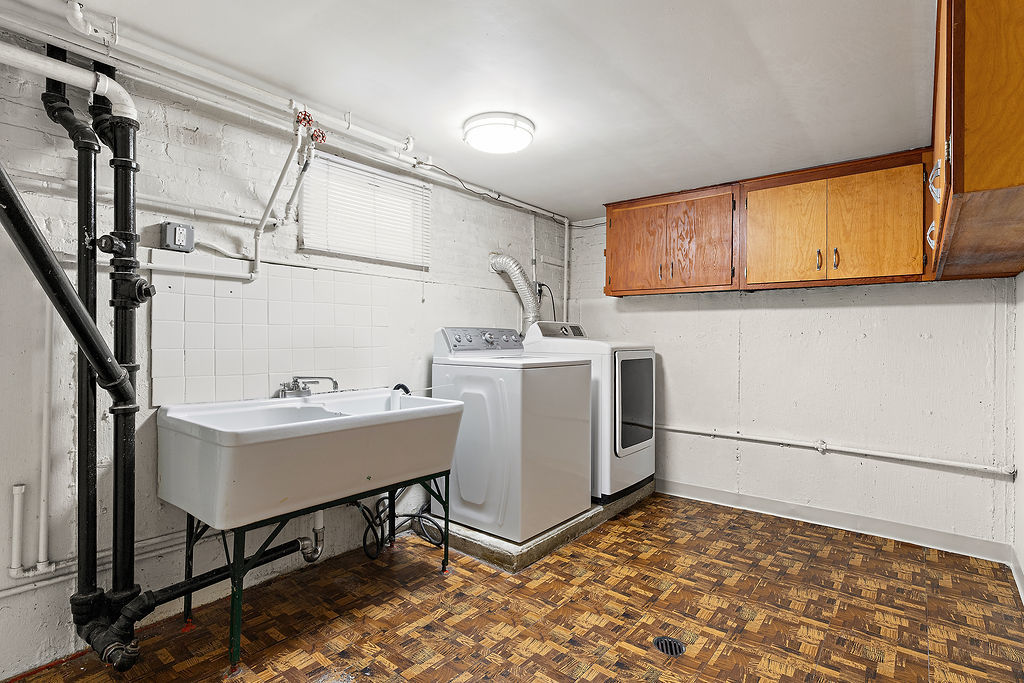 5353 North Nottingham Avenue Chicago, IL 60656 - Photo 16 of 20 a utility room with cabinets