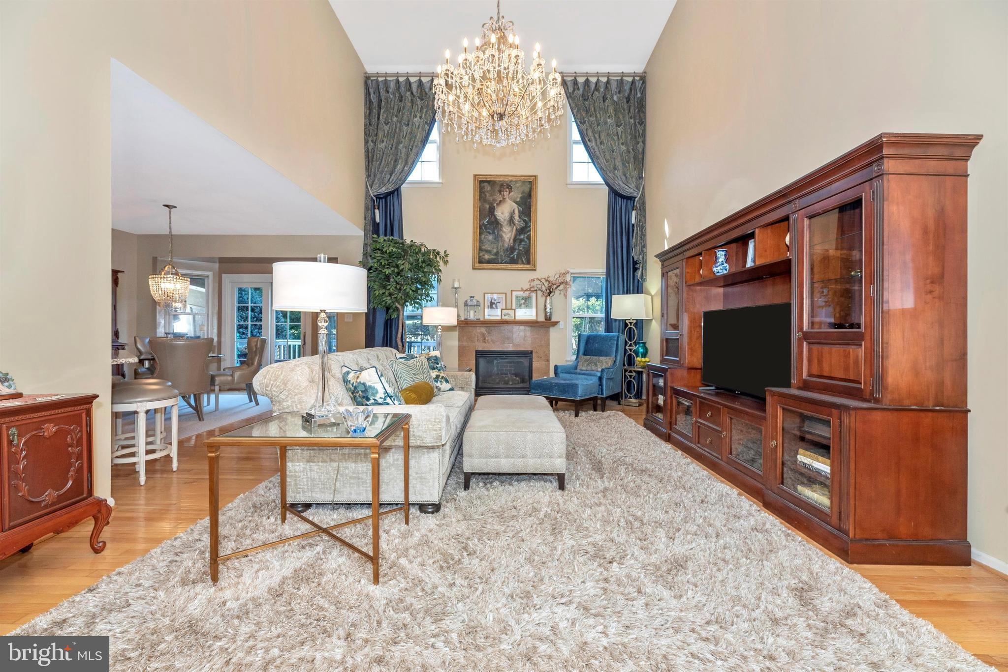 11221 Country Club Road New Market, MD 21774 - Photo 10 of 44 Grand Two-Story Family Room with Gas Fireplace