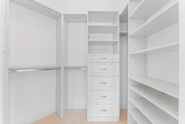 a view of an empty walk in closet