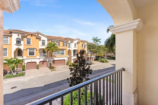 an aerial view of a house with yard swimming pool and outdoor seating