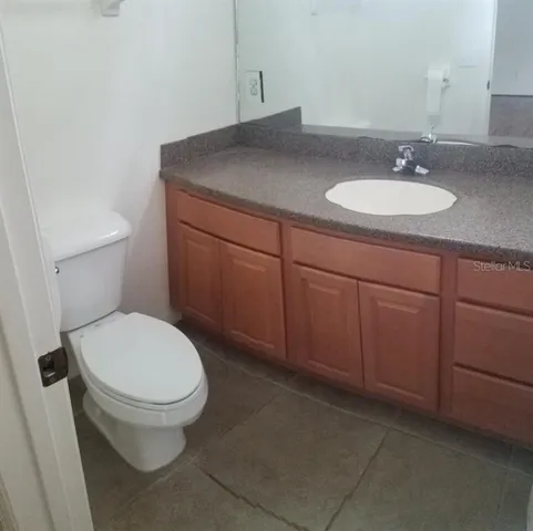 a bathroom with a sink and a toilet