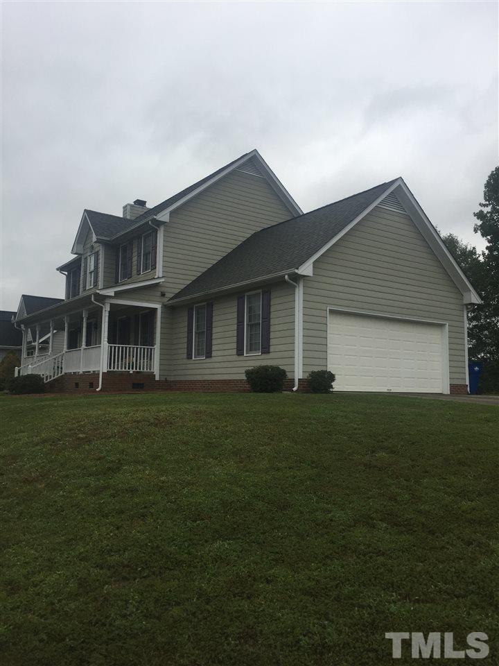 4300 Riverport Road Raleigh, NC 27616 - Photo 2 of 2 a front view of a house with a garden