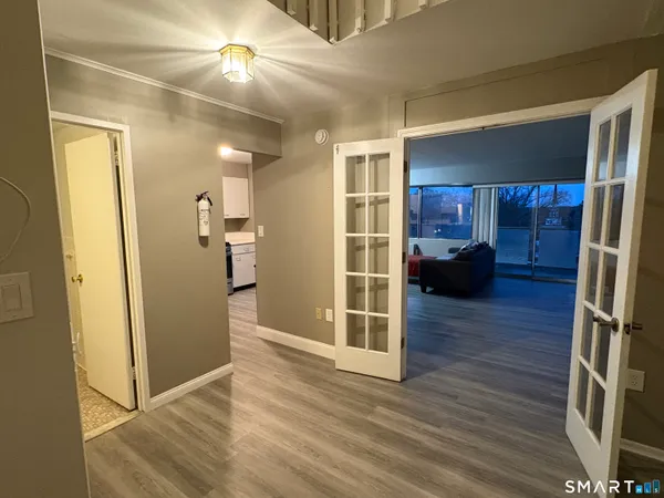 a view of livingroom with furniture and wooden floor