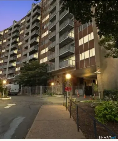 a view of a building with a street