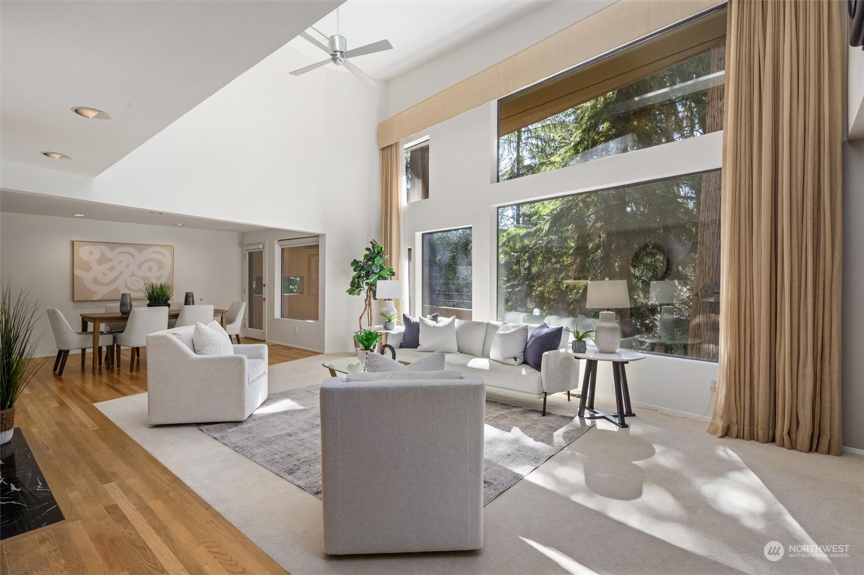 3 Lindley Road Mercer Island, WA 98040 - Photo 2 of 37 a living room with fireplace furniture and a large window