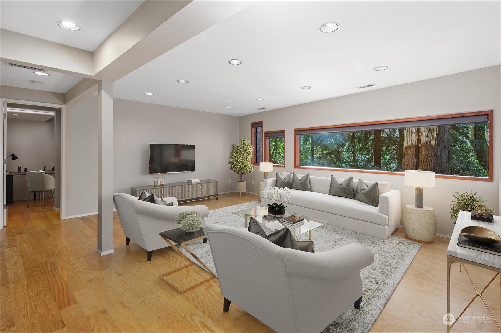 3 Lindley Road Mercer Island, WA 98040 - Photo 23 of 37 a living room with furniture and a flat screen tv