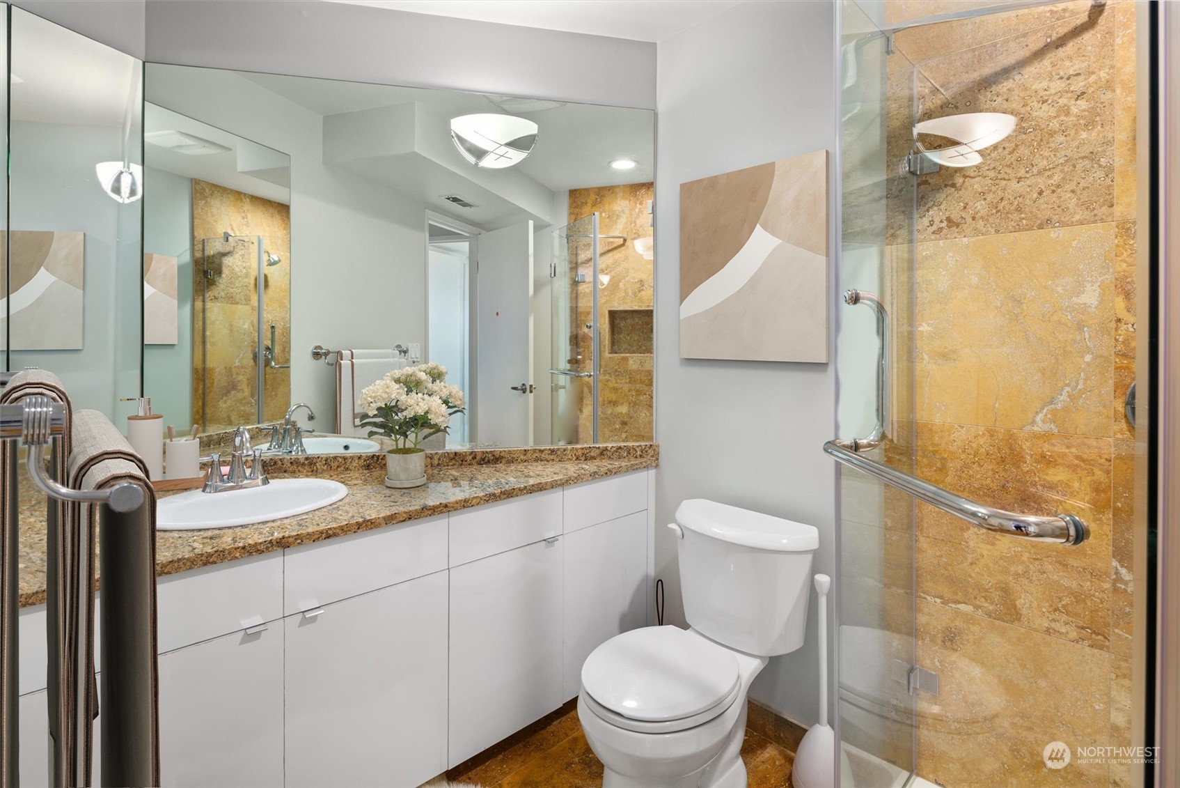 3 Lindley Road Mercer Island, WA 98040 - Photo 27 of 37 a bathroom with a granite countertop sink toilet and shower