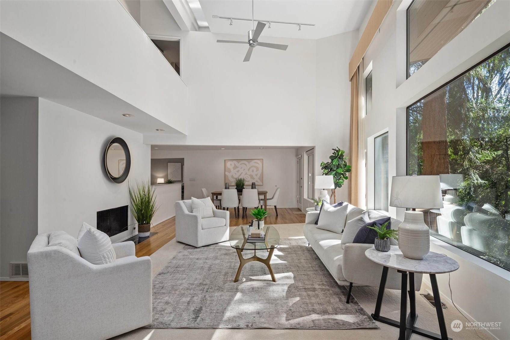 3 Lindley Road Mercer Island, WA 98040 - Photo 3 of 37 a living room with furniture a rug and white walls
