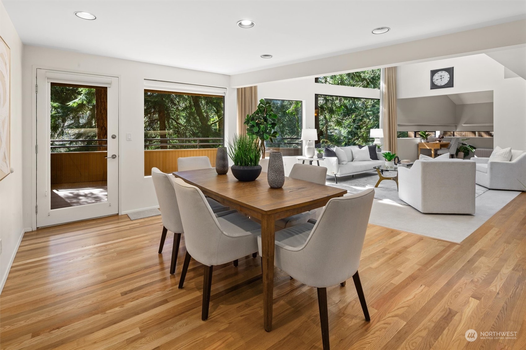 3 Lindley Road Mercer Island, WA 98040 - Photo 5 of 37 a view of a dining room with furniture window and wooden floor