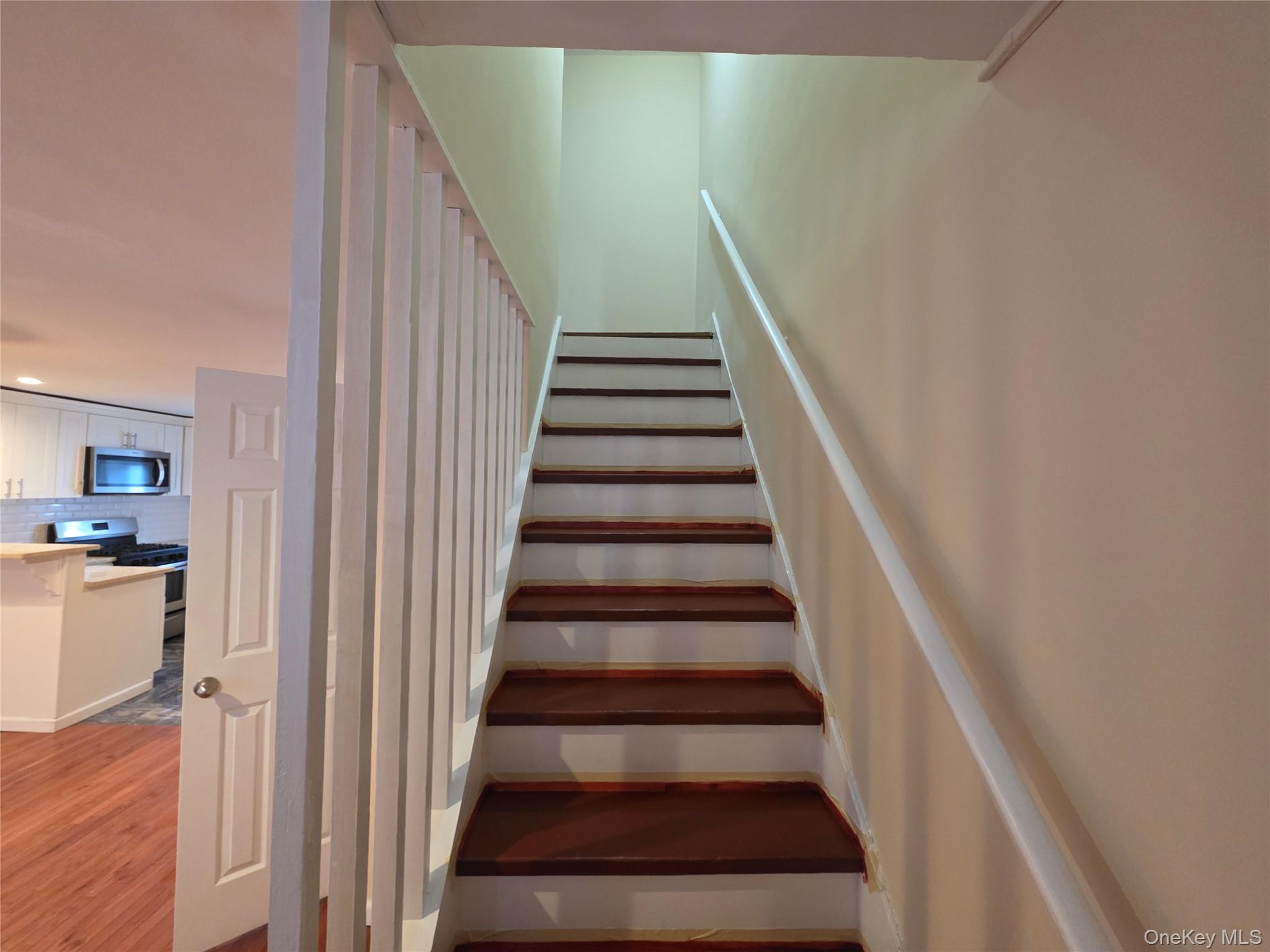 42 Hasbrouck Street Newburgh, NY 12550 - Photo 4 of 8 a view of entryway and gallery with wooden floor