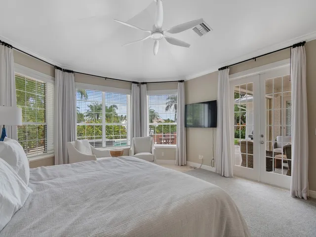 a bathroom with a toilet a sink and a mirror