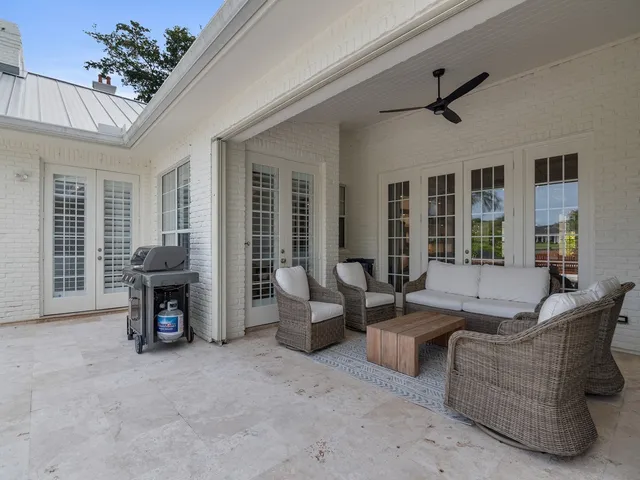 a view of a backyard with swimming pool