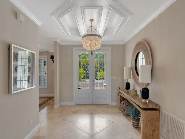 a living room with fireplace furniture and a flat screen tv