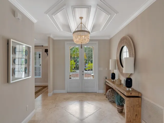 a living room with fireplace furniture and a flat screen tv