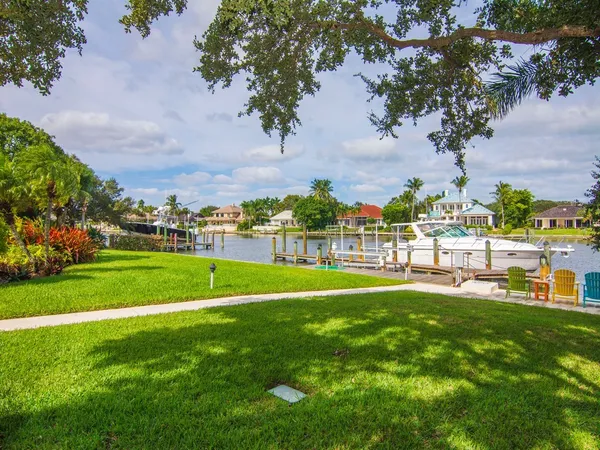 a view of a swimming pool with a lounge chairs