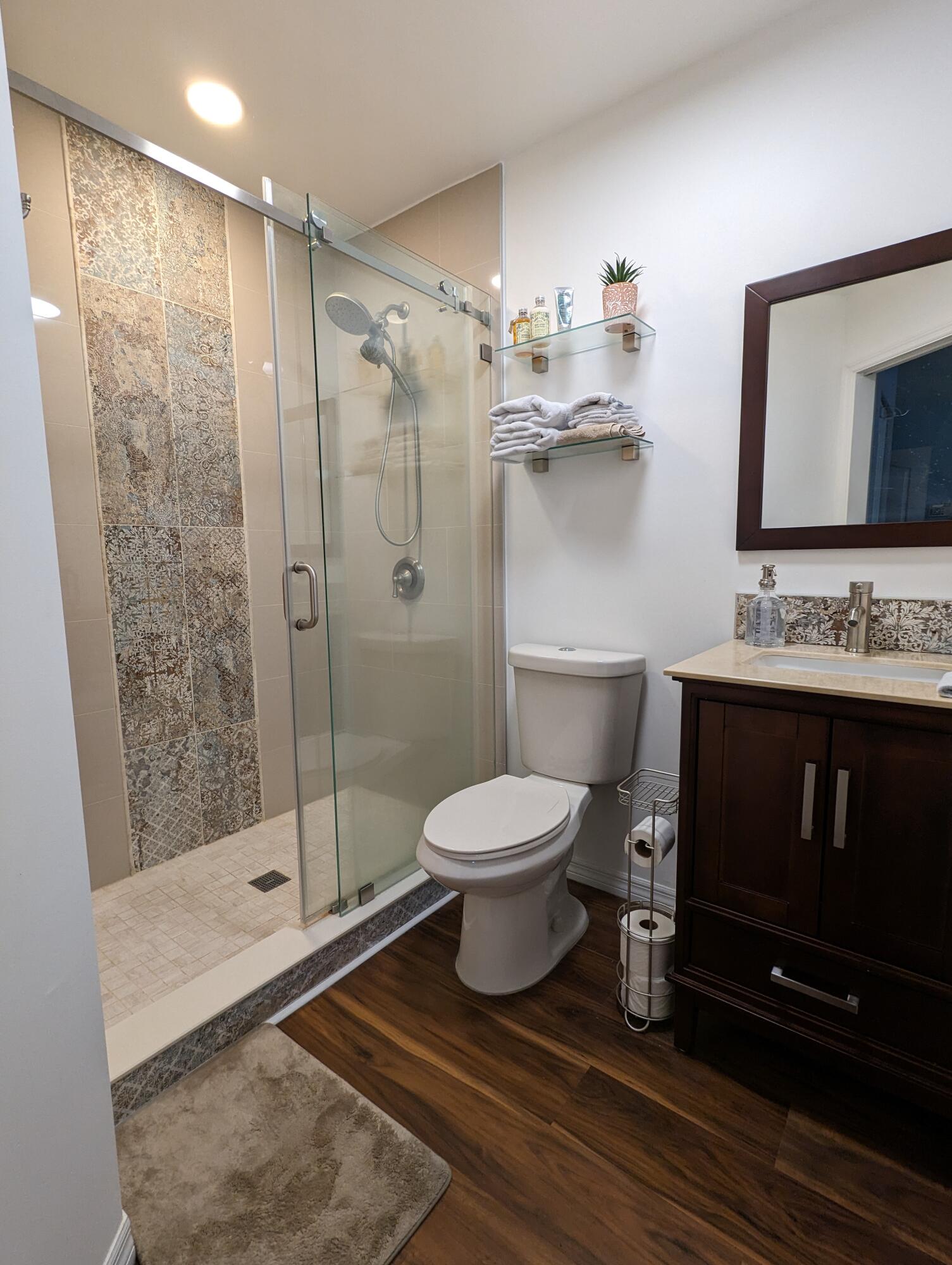 Undisclosed Address Miami, FL 33126 - Photo 7 of 14 a bathroom with a toilet a sink and shower