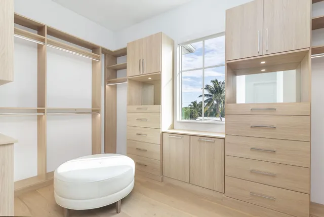 a bathroom with a mirror and a shower