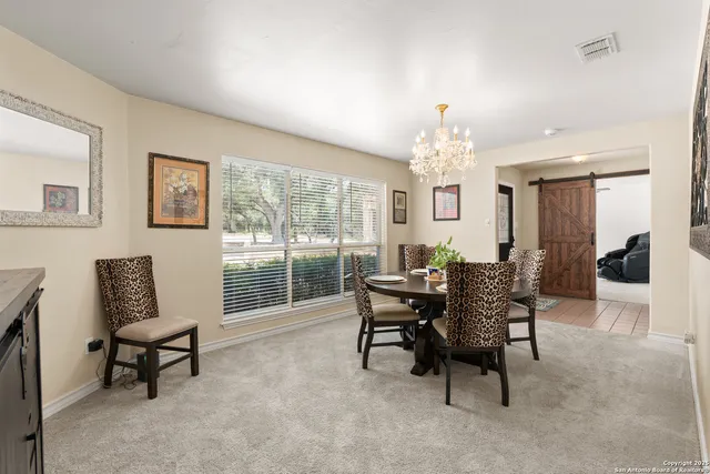 a view of a livingroom with furniture window and outside view