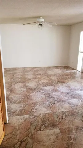 a view of a room with an empty space