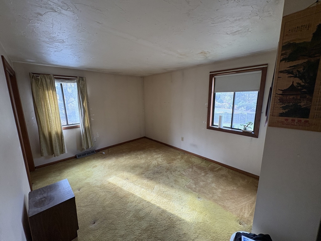 172 Russ Street Randolph, MA 02368 - Photo 11 of 15 an empty room with windows
